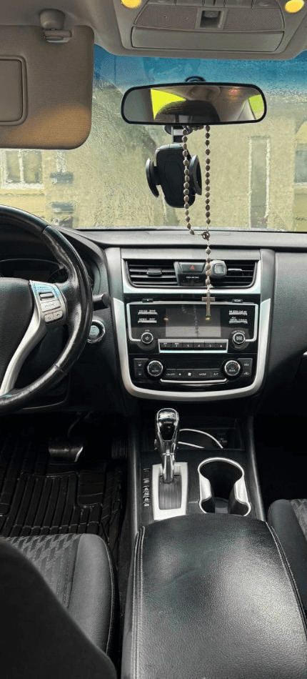 Spotless Nissan Altima cabin after a full interior detail
